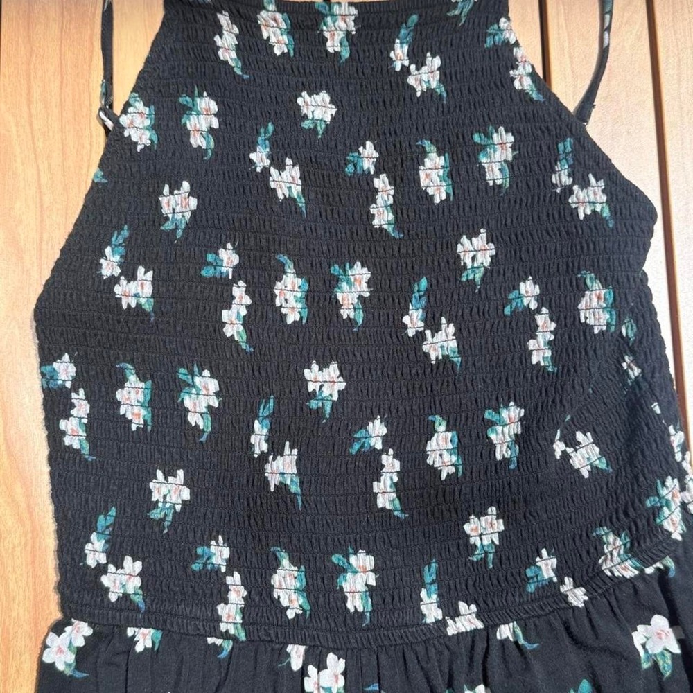 Hollister Co. black floral romper with white and teal flowers, size M